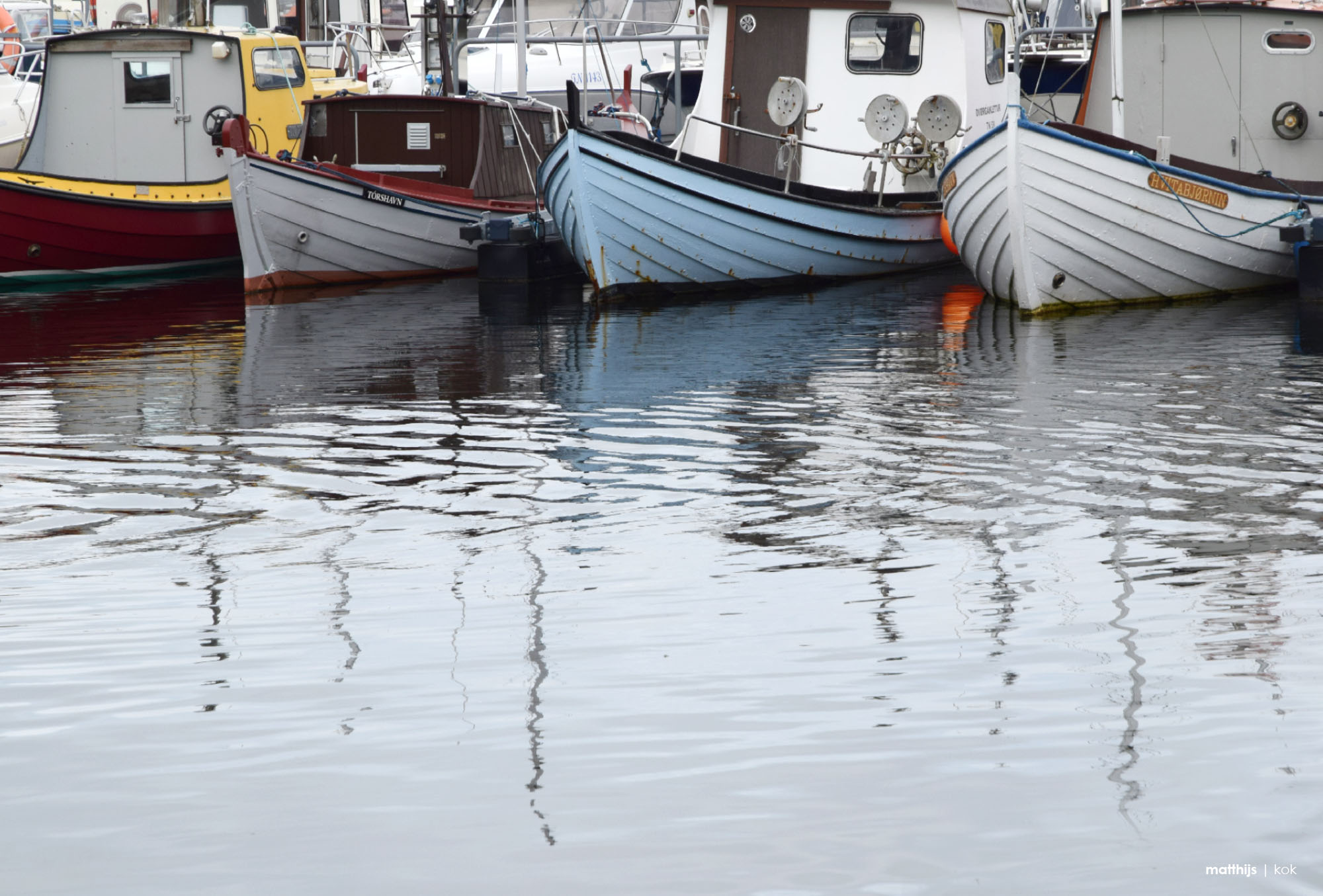 Boats in Torshavn Harbor, Faroe Islands | Photo by Matthijs Kok