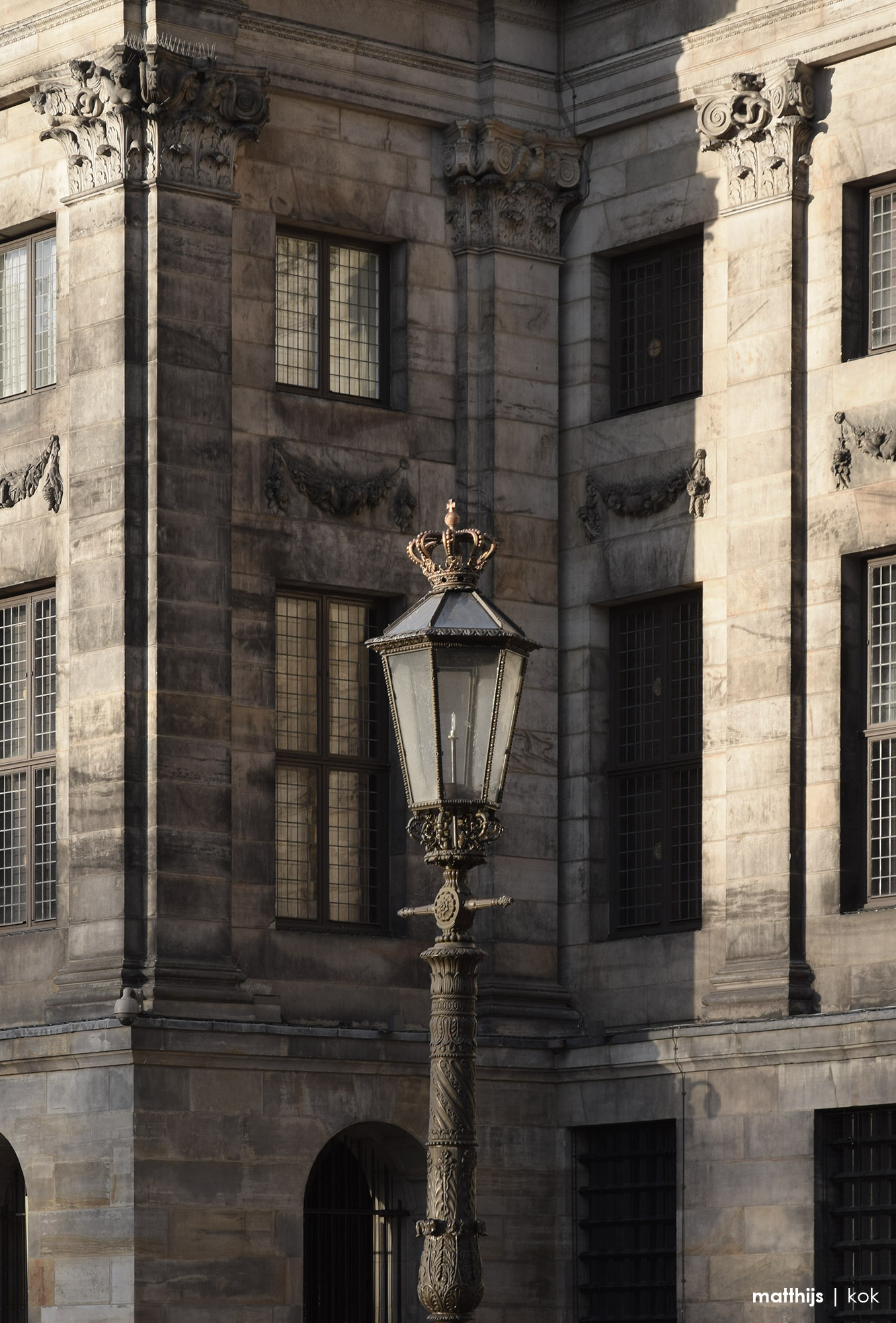 Lantern on Dam Square Amsterdam, The Netherlands | Photography by Matthijs Kok